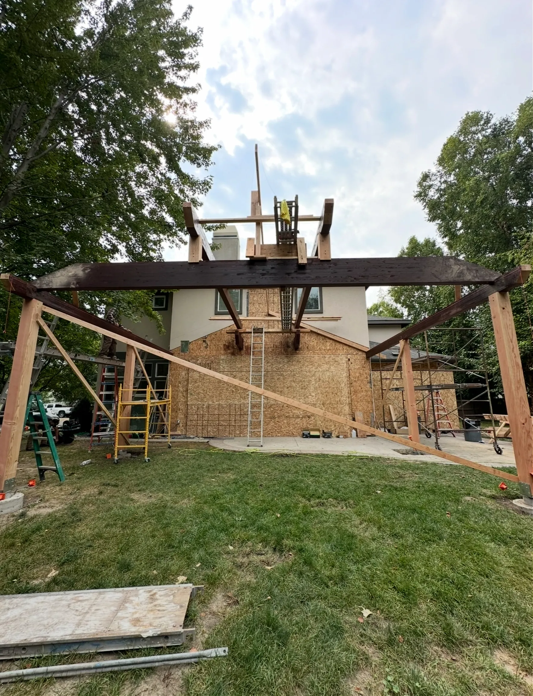 Structural timber framing going up for a backyard pavilion
